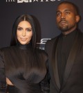 Kim Kardashian and Kanye West arrive on the red carpet at the BET Honors 2015 at Warner Theater on Saturday, Jan. 24, 2015in Washington. (Photo by Kevin Wolf/Invision/AP)