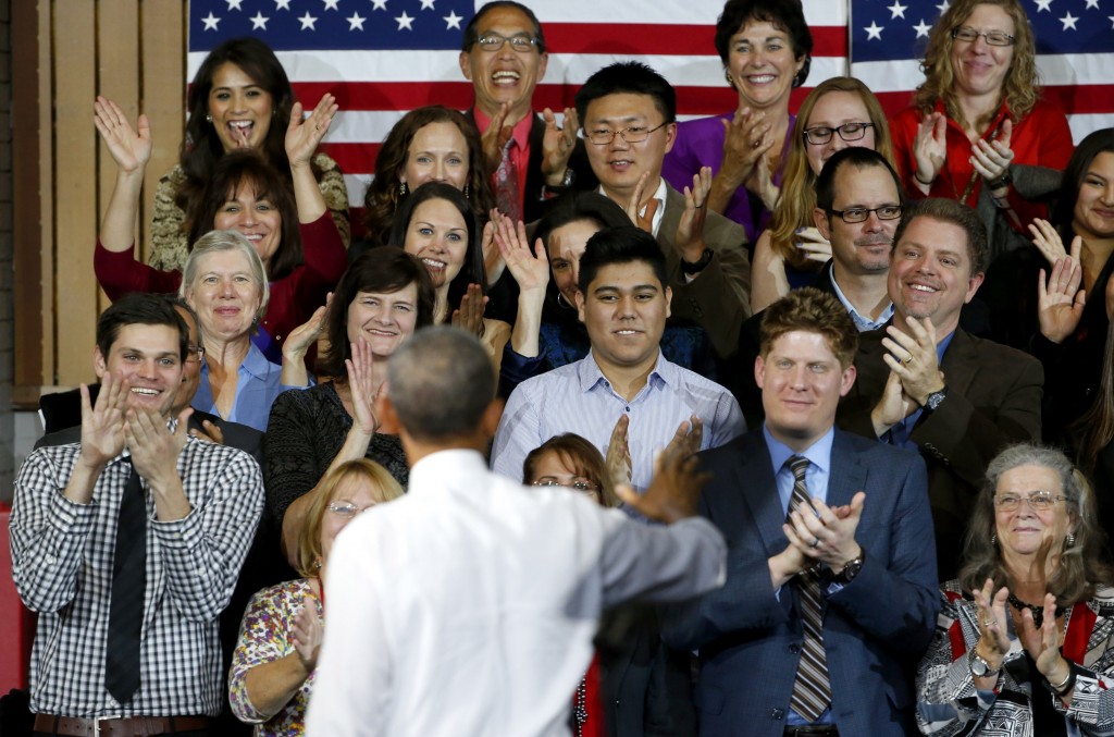 President Barack Obama waves to the crowd after giving a speech Thursday, Jan. 8, 2015, at Central High School in Phoenix. (AP Photo/Ross D. Franklin)