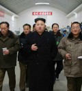 North Korean leader Kim Jong-un tours a precision machine factory in Pyongyang. North Korea's official Korean Central News Agency reported it on Jan. 16, 2015, without saying when the visit was made. (Yonhap)