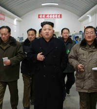 North Korean leader Kim Jong-un tours a precision machine factory in Pyongyang. North Korea's official Korean Central News Agency reported it on Jan. 16, 2015, without saying when the visit was made. (Yonhap)