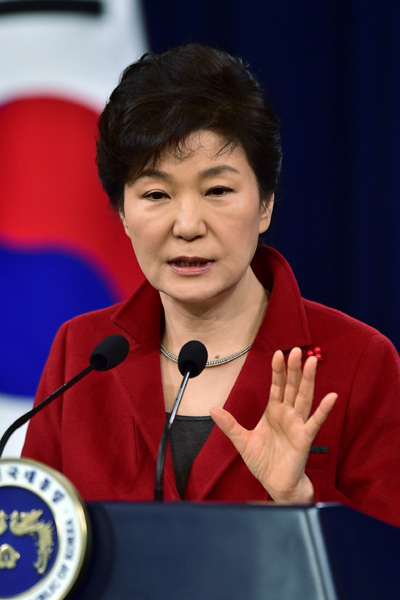 South Korean President Park Geun-hye speaks during her New Year's press conference at the presidential Blue House in Seoul Monday, Jan. 12, 2015. (AP Photo/Jung Yeon-je)