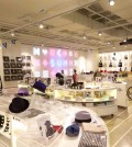SUM, a celebrity shop on the second floor of SMTOWN@coexartium, carries souvenirs and fashion items that SM artists have designed or recommended. (Courtesy of SM Entertainment)