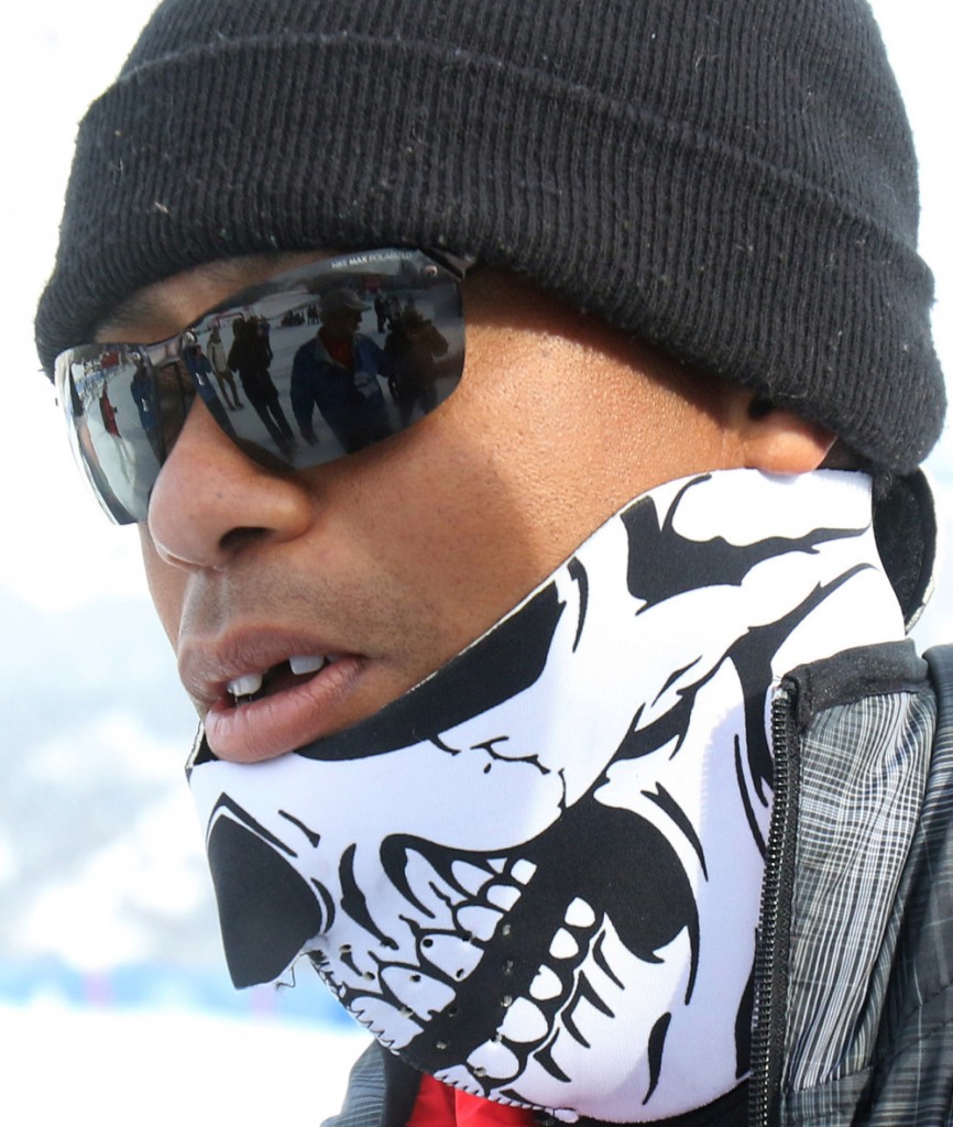 Tiger Woods walks in the finish area of an alpine ski, women's World Cup super-G, in Cortina d'Ampezzo, Italy, Monday, Jan. 19, 2015. Lindsey Vonn won a super-G Monday for her record 63rd World Cup victory and celebrated with an embrace from a surprise visitor Ã³ boyfriend Tiger Woods. The American broke Annemarie Moser-Proell's 35-year-old record of 62 World Cup wins with a flawless run down the Olympia delle Tofane course, finishing 0.85 ahead of Anna Fenninger of Austria. (AP Photo/Armando Trovati)