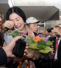 Shin Eun-mi, who was deported by Korean Immigration Services for holding an allegedly pro-North Korea lecture series, arrived in LAX Saturday. (Park Sang-hyuk/The Korea Times)