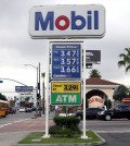 A cyclist rides by a sign at a gas station in Los Angeles posting the latest gas prices on Friday, Feb. 27, 2015. Gas prices in California soared overnight as a result of a combination of supply-and-demand factors worsened by the shutdown of two refineries that produce a combined 16 percent of the states gasoline. (AP Photo/Nick Ut)