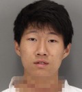 This photo provided by the Santa Clara Police Department, shows Dillon Kim after he was booked on attempted homicide charges on Tuesday, Feb. 17, 2015.  Kim, a university student, has been arrested on suspicion of stabbing and wounding his roommate in their dormitory on a Northern California campus. Santa Clara police Lt. Kurt Clarke says that Dillon Kim stabbed his roommate multiple times with a knife about 3:30 a.m. Wednesday at Santa Clara University. (AP Photo/Santa Clara Police Department)