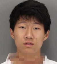 This photo provided by the Santa Clara Police Department, shows Dillon Kim after he was booked on attempted homicide charges on Tuesday, Feb. 17, 2015.  Kim, a university student, has been arrested on suspicion of stabbing and wounding his roommate in their dormitory on a Northern California campus. Santa Clara police Lt. Kurt Clarke says that Dillon Kim stabbed his roommate multiple times with a knife about 3:30 a.m. Wednesday at Santa Clara University. (AP Photo/Santa Clara Police Department)