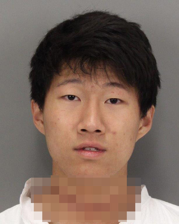 This photo provided by the Santa Clara Police Department, shows Dillon Kim after he was booked on attempted homicide charges on Tuesday, Feb. 17, 2015. Kim, a university student, has been arrested on suspicion of stabbing and wounding his roommate in their dormitory on a Northern California campus. Santa Clara police Lt. Kurt Clarke says that Dillon Kim stabbed his roommate multiple times with a knife about 3:30 a.m. Wednesday at Santa Clara University. (AP Photo/Santa Clara Police Department)