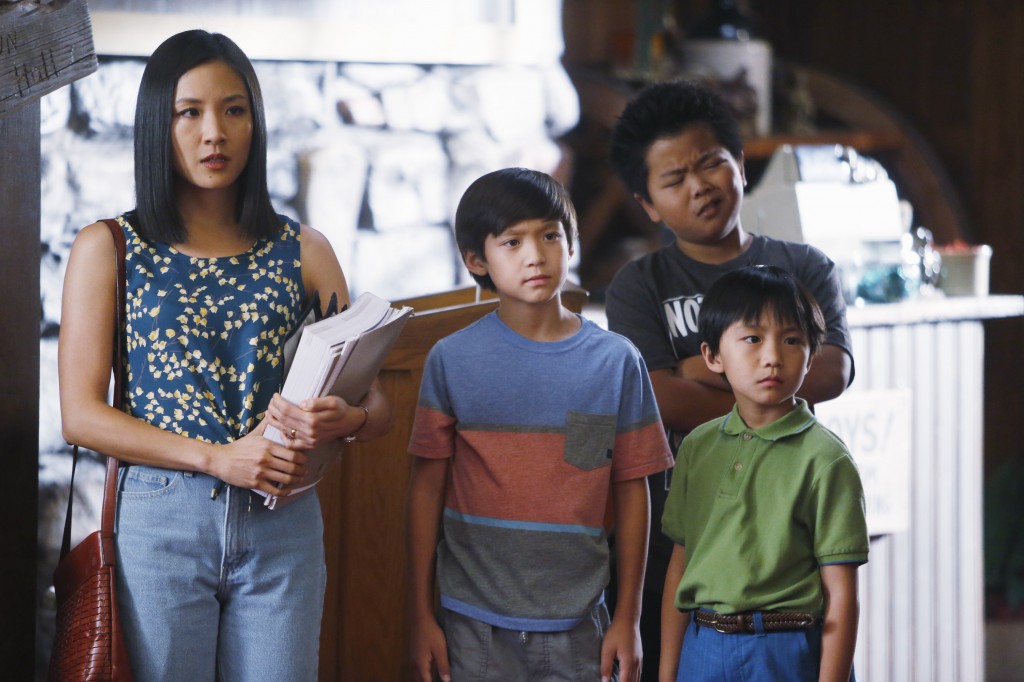 In this image released by ABC, Constance Wu, from left, Forrest Wheeler, Hudson Yang and Ian Chen  appear in a scene from the new comedy series "Fresh Off the Boat," previewing Wednesday with episodes at 8:30 p.m. and 9:30 p.m. EST. (AP Photo/ABC, Jordin Althaus)