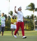 Kim Sei-young of South Korea pumps her fist in the air after winning the Pure Silk Bahamas LPGA Classic at the Ocean Club Golf Course, in Paradise Island, Bahamas, Sunday, Feb. 8, 2015. (AP Photo/Tim Aylen)