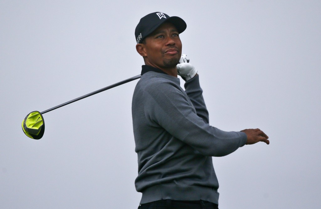 Tiger Woods hits an errant drive on the second hole during the pro-am at the Farmer Insurance Open golf tournament at Torrey Pines, Wednesday, Feb. 4, 2015, in San Diego. (AP Photo/Lenny Ignelzi)