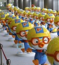 Dolls featuring the globally popular Korean animation character "Pororo" are displayed at a character licensing show in Seoul on July 17, 2013. The TV animation series "Pororo the Little Penguin" debuted 10 years ago and has been exported to 120 countries around the world thus far. (Yonhap)