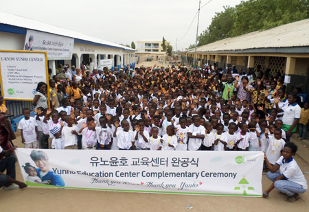 Students and local residents celebrate the opening of "Yunho Education Center," a school named after K-pop singer U-Know Yunho, in Bongo, northern Ghana, on Feb. 20. (Courtesy of Food for the Hungry)