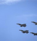Jordanian Air Force fighter jets fly during the funeral of slain Jordanian pilot, Lt. Muath al-Kaseasbeh, at his home village of Ai, near Karak, Jordan, Wednesday, Feb. 4, 2015. Outrage and condemnation poured across the Middle East on Wednesday as horrified people learned of the video purportedly showing the Islamic State group burn a Jordanian pilot to death. (AP Photo/Nasser Nasser)
