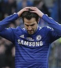 Chelsea's Cesc Fabregas reacts after missing a chance to score against Burnley during an English Premier League soccer match at the Stamford Bridge ground in London, Saturday, Feb. 21, 2015. The match ended 1-1 draw. (AP Photo/Lefteris Pitarakis)