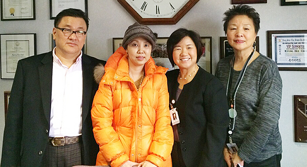 Park Sung-mi, second from left, donated toward the Korean Medical Program's Community Bridge Fund Wednesday. (Photo courtesy of KMP)