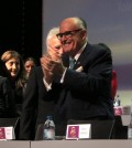 Former New York City Mayor Rudy Giuliani claps at the start of a day-long conference on human rights organized by the Iranian exile opposition group National Council of Resistance of Iran on Saturday,
March 7, 2015. Giuliani was one of the main speakers. (AP Photo/Frank Jordans)