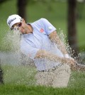 Adam Scott, of Australia, hits out of the sand on the 16th hole during the first round of the Valspar Championship golf tournament, Thursday, March 12, 2015, at Innisbrook in Palm Harbor, Fla. (AP Photo/Chris O'Meara)