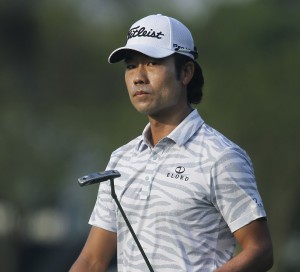 Kevin Na walks off the second green after putting during the first round of the Arnold Palmer Invitational golf tournament , Thursday, Mar. 19, 2015, in Orlando, Fla. (AP Photo/Reinhold Matay)