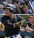 Pittsburgh Pirates' Kang Jung-ho of South Korea hits a double during a spring training exhibition baseball game against the New York Yankees in Bradenton, Fla., Thursday, March 5, 2015.  (AP Photo/Gene J. Puskar)