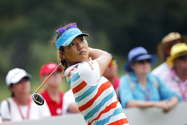 Lydia Ko of New Zealand tees off on the 17th hole during the second round of the HSBC Women's Champions golf tournament on Friday, March 6, 2015 in Singapore. (AP Photo/Wong Maye-E)