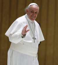 Pope Francis waves to faithful as he arrives on the occasion of an audience with participants to the course promoted by the Penitentiary Apostolic Tribunal, in the Paul VI hall at the Vatican,  Thursday, March 12, 2015. (AP Photo/Andrew Medichini)