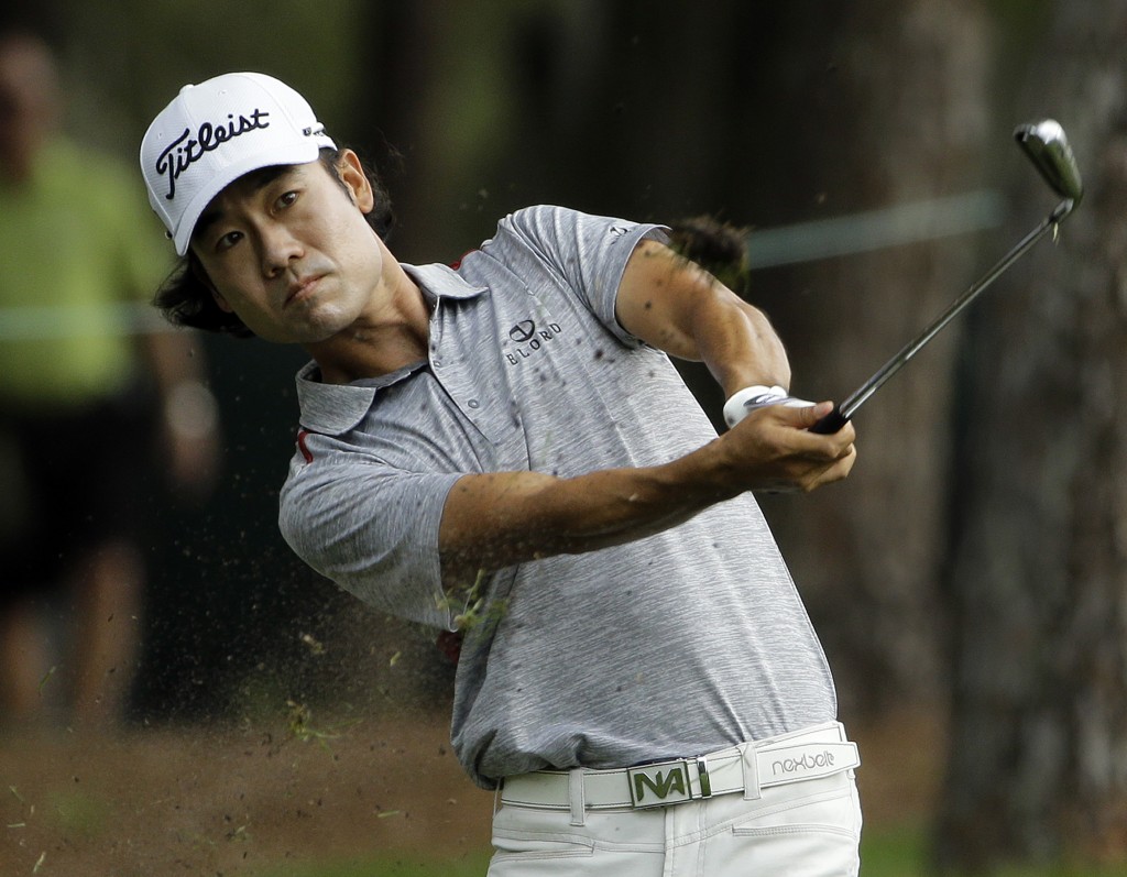 Kevin Na hits from the rough along the 11th hole during the first round of the Valspar Championship golf tournament, Thursday, March 12, 2015, at Innisbrook in Palm Harbor, Fla. (AP Photo/Chris O'Meara)