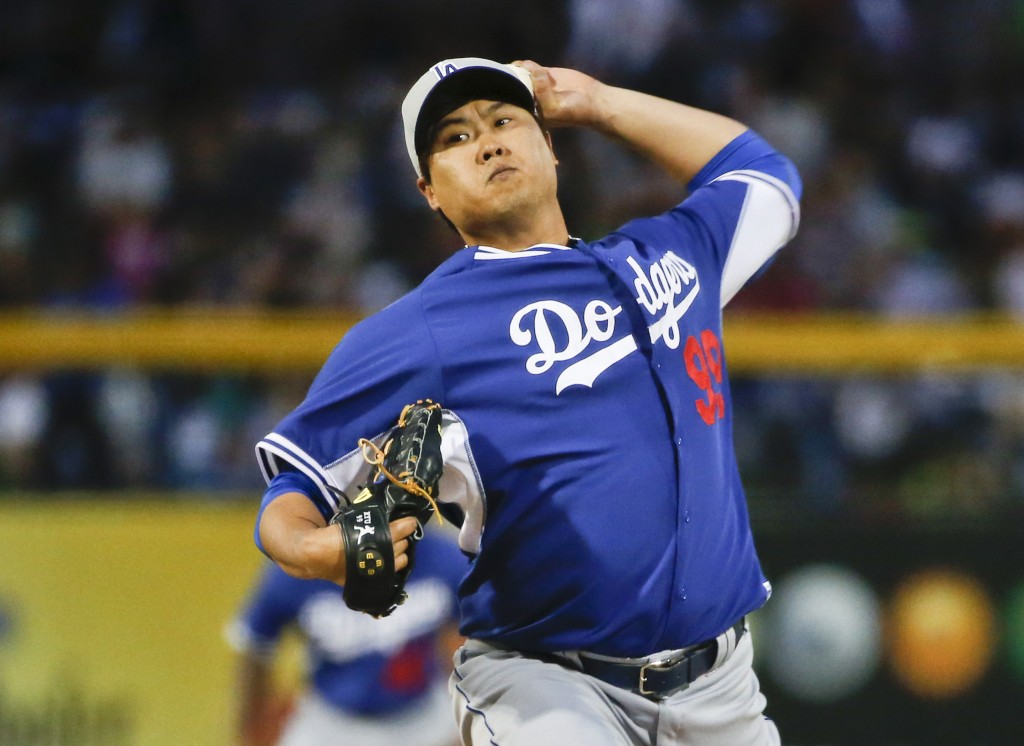 Los Angeles Dodgers starting pitcher Hyun-Jin Ryu throws against the San Diego Padres during a spring training baseball game Thursday, March 12, 2015, in Peoria, Ariz.  (AP Photo/Lenny Ignelzi)