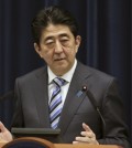 FILE - In this March 10, 2015 file photo Japanese Prime Minister Shinzo Abe speaks during a news conference at his official residence in Tokyo. Abe will become the first Japanese prime minister to address a joint meeting of Congress in late April, the House speaker has announced. Foreign leaders have been accorded the honor 111 times since World War II, but not Japan, despite the tight alliance forged with the U.S. in the 70 years since 1945.  (AP Photo/Eugene Hoshiko, File)/2015-03-28 05:54:39/