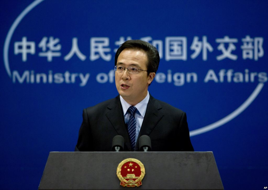Foreign Ministry spokesman Hong Lei urged all parties that are affected by the missile testings to remain calm. (AP Photo/Andy Wong)