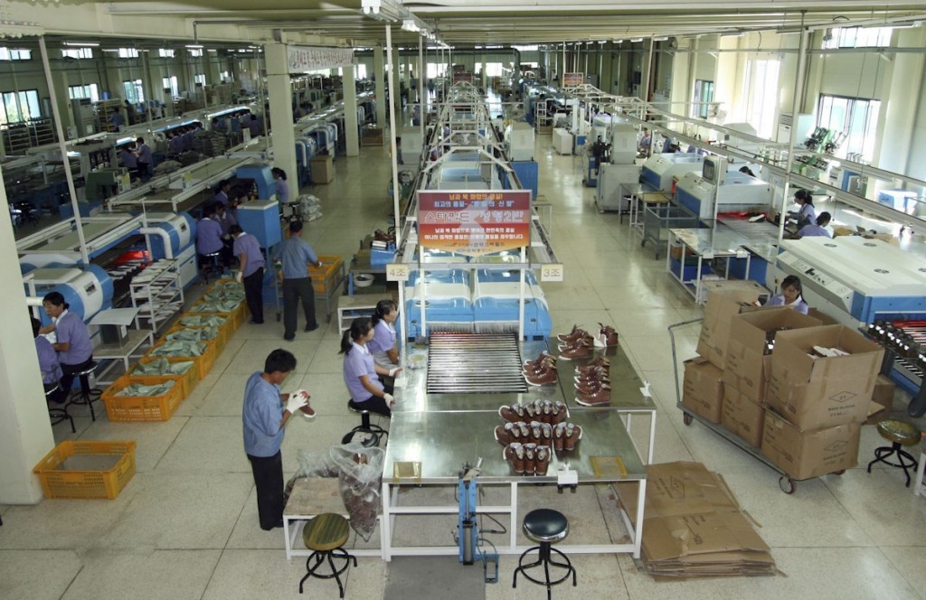 North Korean employees work at a factory at the industrial complex in the North's border town of Kaesong. The joint factory park reopened earlier in the day, more than five months after it was shut down amid rising tensions across the border of the two Koreas.