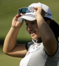 Sei Young Kim, of South Korea, smiles after a birdie on the ninth hole during the second round of the LPGA Tour ANA Inspiration golf tournament at Mission Hills Country Club Friday, April 3, 2015 in Rancho Mirage, Calif. (AP Photo/Chris Carlson)