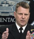 In this photo released by the Department of Defense, Vice Adm. William Gortney, staff director for the Joint Chiefs, conducts a news briefing about the current situation in Libya at the Pentagon in Washington, Monday, March 28, 2011. (AP Photo/Department of Defense, Cherie Cullen)