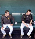 left, and Pirates second baseman Neil Walker in the dugout before a spring training exhibition baseball game against the New York Yankees at McKechnie Field in Bradenton, Fla., Thursday, March 5, 2015. (AP Photo/Gene J. Puskar)