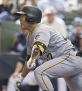 Pittsburgh Pirates' Jung Ho Kang gets his first Major League hit off of Milwaukee Brewers' Kyle Lohse during the seventh inning of a baseball game Sunday, April 12, 2015, in Milwaukee. (AP Photo/Tom Lynn)