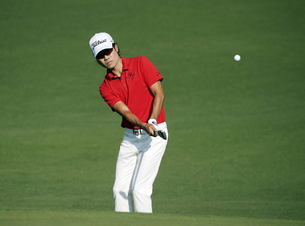 Kevin Na hits on the second fairway during the first round of the Masters golf tournament Thursday, April 9, 2015, in Augusta, Ga. (AP Photo/Chris Carlson)