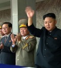 In this image taken from video North Korean leader Kim Jong Un, right, waves to spectators and participants during a military parade marking the 65th anniversary of the country's founding, Monday, Sept. 9, 2013, in Pyongyang, North Korea. (AP Photo/KRT via AP Video)