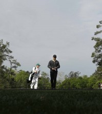 Rory McIlroy, of Northern Ireland, prepares to tee off on the fourth hole during a practice round for the Masters golf tournament Monday, April 6, 2015, in Augusta, Ga. (AP Photo/Charlie Riedel)