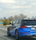 In this Monday, March 30, 2015 photo provided by Delphi Corp., the company's autonomous car approaches New York City, its final destination of a 3,400-mile road trip across the U.S., near Jersey City, N.J. Ninety-nine percent of the time, the car steered itself; only in very tricky situations, like a construction zone, did drivers take control. Now engineers will take the reams of data from the trip and use it to further advance autonomous technology. (AP Photo/Delphi Corp.)