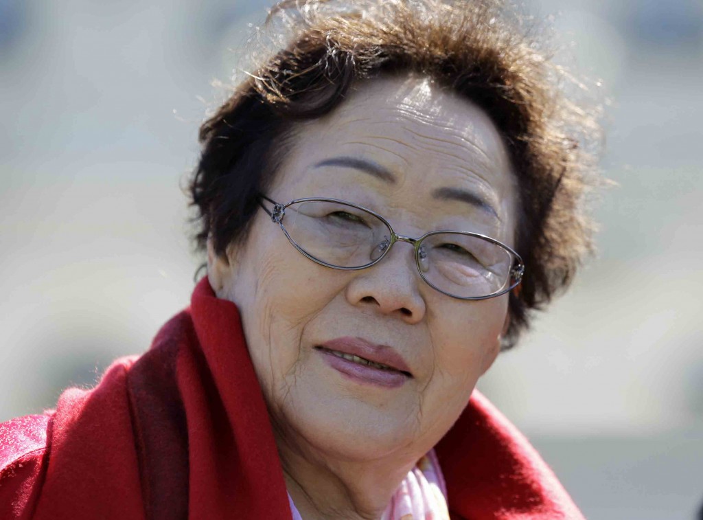 Lee Yong-soo of South Korea is seen of the West Lawn of the Capitol Hill in Washington, Tuesday, April 28, 2015. Yong Soo Lee is one of dozens of surviving “comfort women” from Korea other Asian countries that were forced into sexual servitude by Japanese troops. (AP Photo/Luis M. Alvarez)