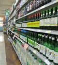 Bottles of soju line shelves at a Los Angeles Korean market.