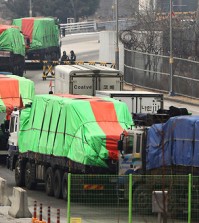 South Korean trucks transport humanitarian aid to North Koreans in this photo. (Yonhap)
