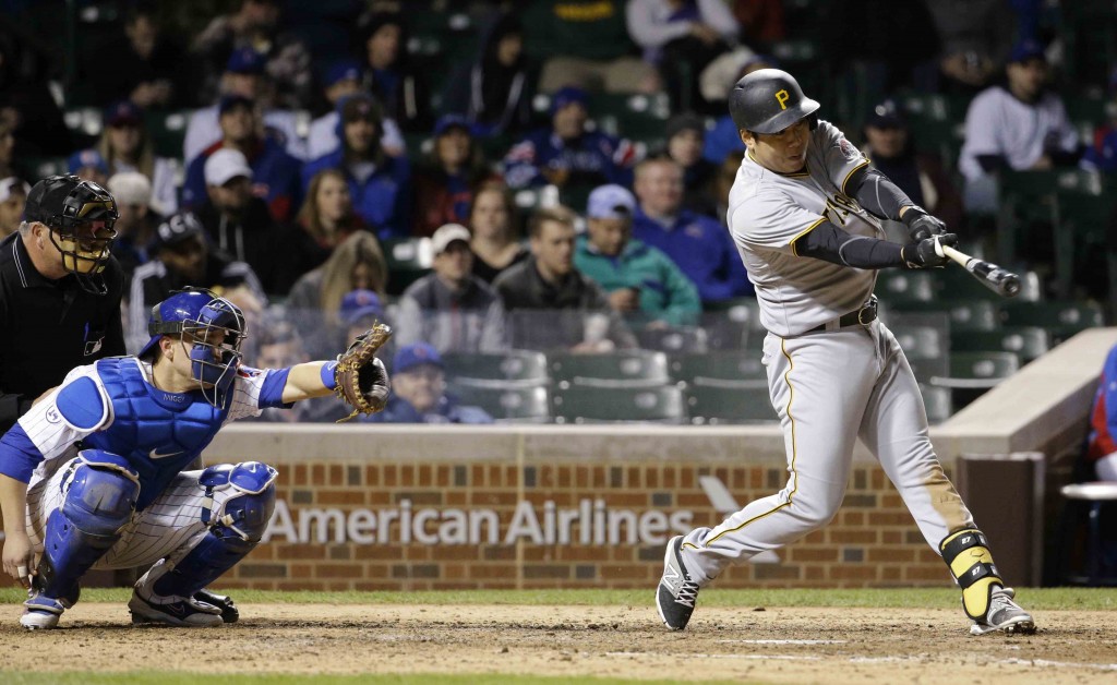 Pittsburgh Pirates' Jung Ho Kang, of South Korea, hits an one-run double against the Chicago Cubs during the ninth inning of a baseball game in Chicago, Wednesday, April 29, 2015. (AP Photo/Nam Y. Huh)