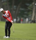 Lydia Ko of New Zealand chips the ball up to the sixth green of the Lake Merced Golf Club during the first round of the Swinging Skirts LPGA Classic golf tournament Thursday, April 23, 2015, in Daly City, Calif. (AP Photo/Eric Risberg)