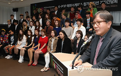 KOCCA President Song Sung-gak speaks Thursday during a press conference about the introduction of K-pop musicians from a variety of genres to the world market through three showcases in Canada, Singapore and France. (Yonhap)