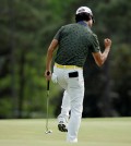 Kevin Na reacts to a birdie putt on the 18th hole during the second round of the Masters golf tournament Friday, April 10, 2015, in Augusta, Ga. (AP Photo/Matt Slocum)