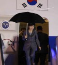 South Korean President Park Geun-hye descends from the plane upon her arrival to the military airport in Bogota, Colombia, Thursday, April 16, 2015. Park Geun-hye is in Colombia in an official two-days visit and will then tour Peru, Chile and Brazil. (AP Photo/Fernando Vergara)