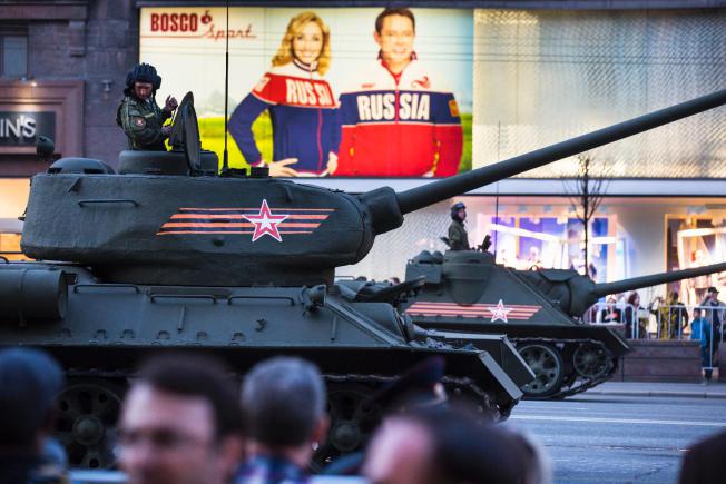 World War II era Soviet tanks T-34, front, and other military vehicles make their way to Red Square during a rehearsal for the Victory Day military parade which will take place at Moscow\'s Red Square on May 9 to celebrate 70 years after the victory in WWII, in Moscow, Russia, Wednesday, April 29, 2015. (AP Photo/Alexander Zemlianichenko)