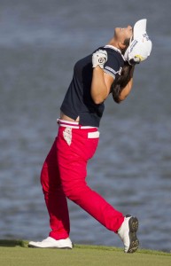 Sei Young Kim, of South Korea celebrates after chipping in a birdie to force a playoff with Inbee Park, of South Korea, during the LPGA Lotte Championship golf tournament at Ko Olina Golf Club, Saturday, April 18, 2015, in Kapolei, Hawaii. Kim won the tournament. (AP Photo/Eugene Tanner)