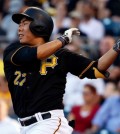 Pittsburgh Pirates' Kang Jung-ho drives in a run with a single off Miami Marlins pitcher Jose Urena during the first inning of a baseball game in Pittsburgh, Tuesday, May 26, 2015. (AP Photo/Gene J. Puskar)